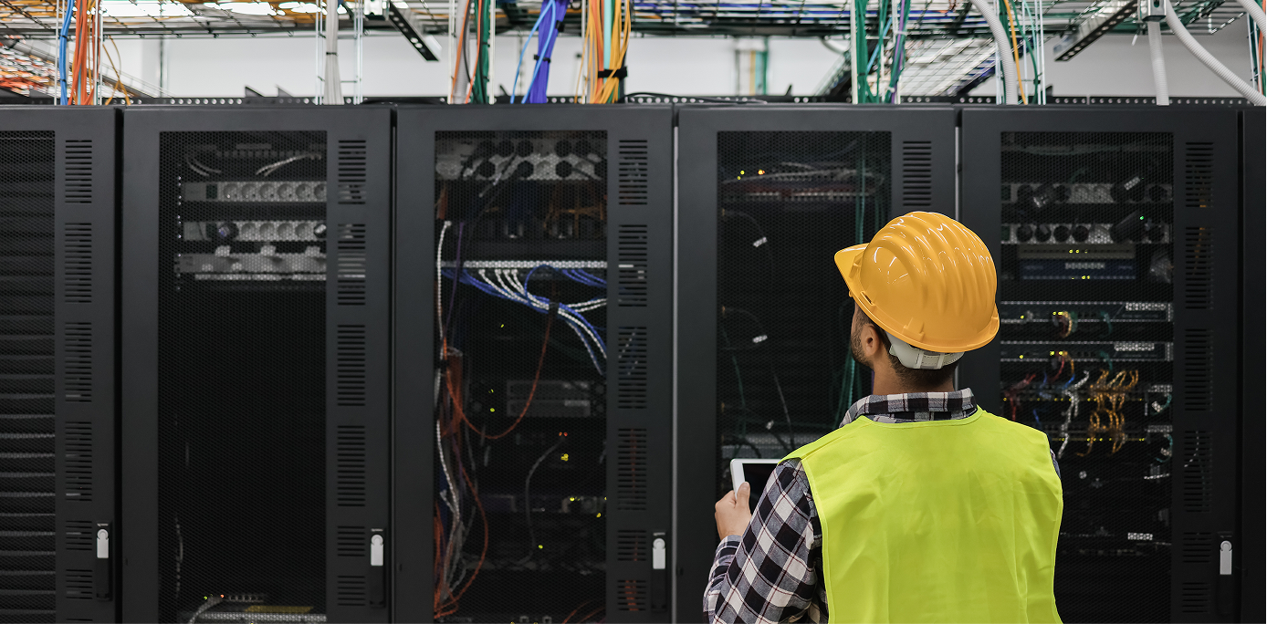 Technician working in a data centre