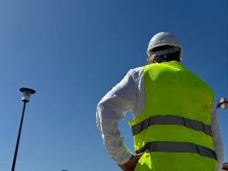Site worker in high-visibility clothing